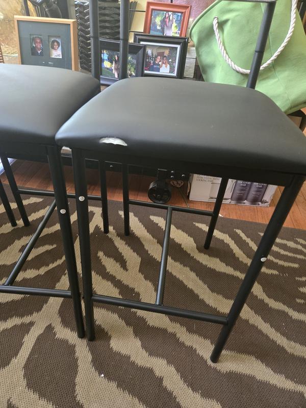 One of the bar stool padded seat received was torned.