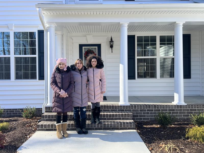 Me and my daughters wearing the Coats