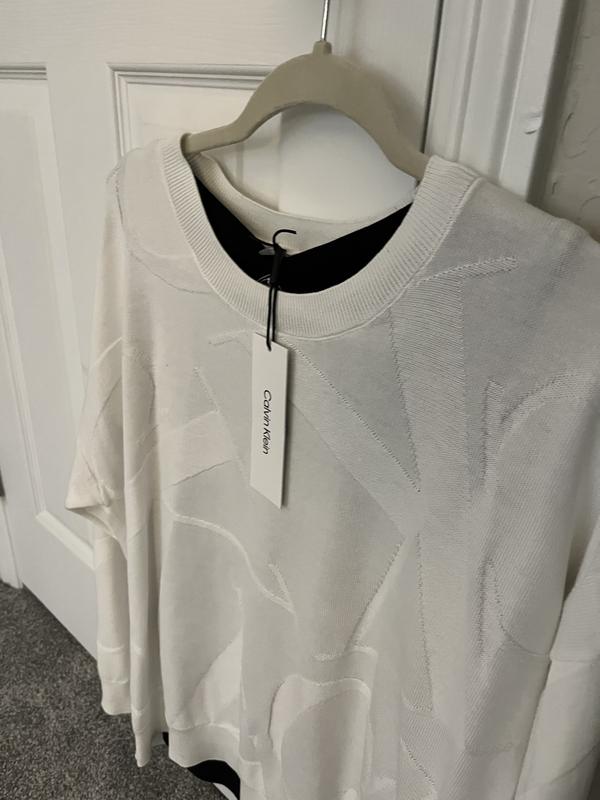 Note you can see color under this lightweight sweater.