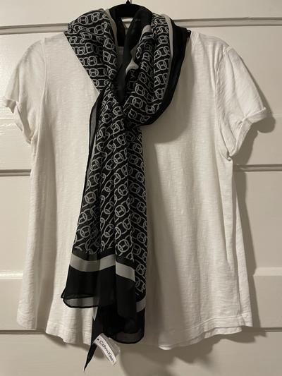 With white top. The white in the scarf is more off white.