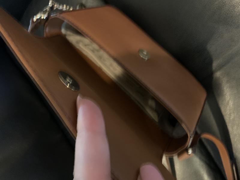 Inside- flap doesn’t fold over open