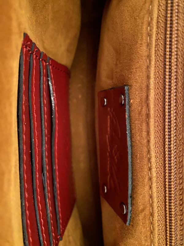 Crossbody length or option as clutch. Card slots. Delicate looking & functional.