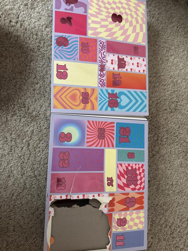 This is what the whole advent calendar looks like, even with the perforations you can’t get through the thick cardboard underneath