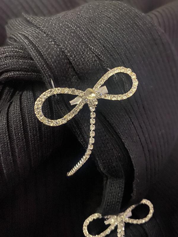 Bow intact, Bow missing string of rhinestones and center stone