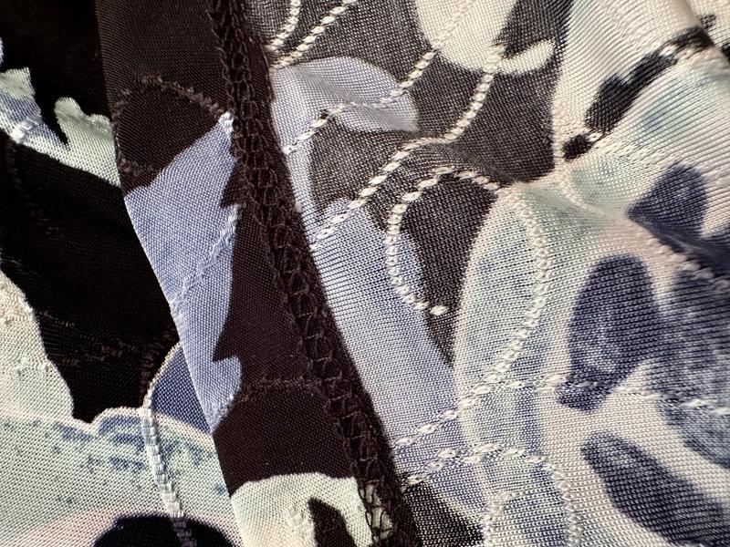 Stitched well. Fabric is printed on one side