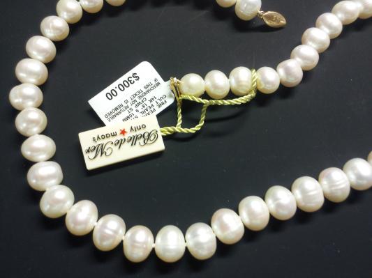 Not close to round or white