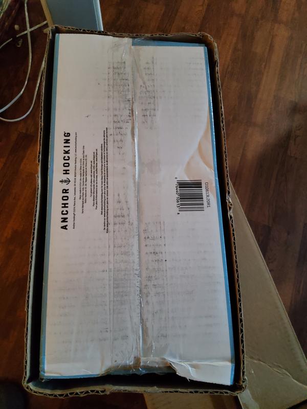 How product was boxed before putting in mailing box.  Assuming it was because the original box was torn, I removed the fix only to get glass shards all over my counter top.  Needless to say, I'm returning for a refund.