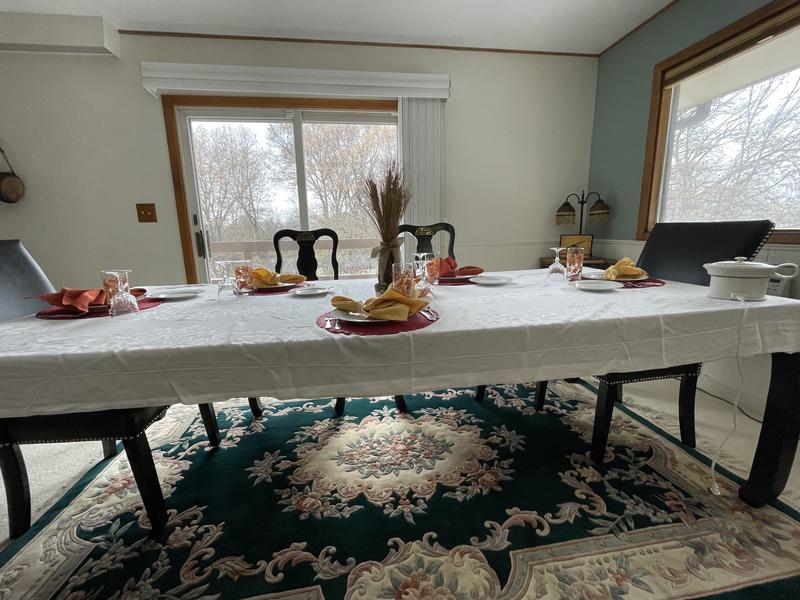 The chairs are at the head and end of the table