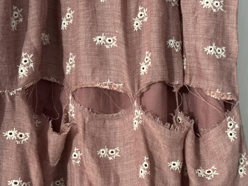 The threading came undone on the dress at the seams