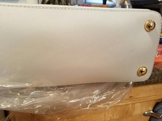 dirty/sticky discolored spots on bottom