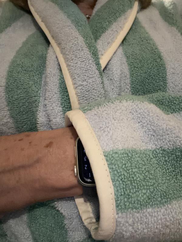 Piping on sleeves and lapel.