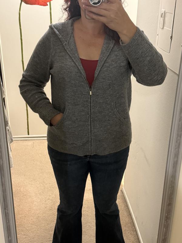Hoodie worn over a tank with jeans for work.