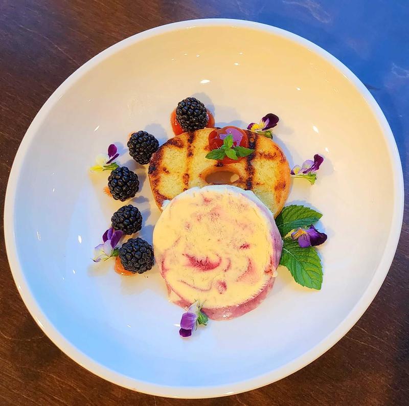 Grilled donut with berry swirl ice cream in Pasta bowl