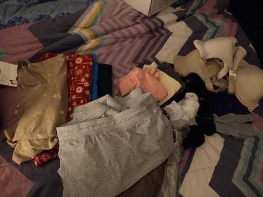 All the clothes that are in the suitcase