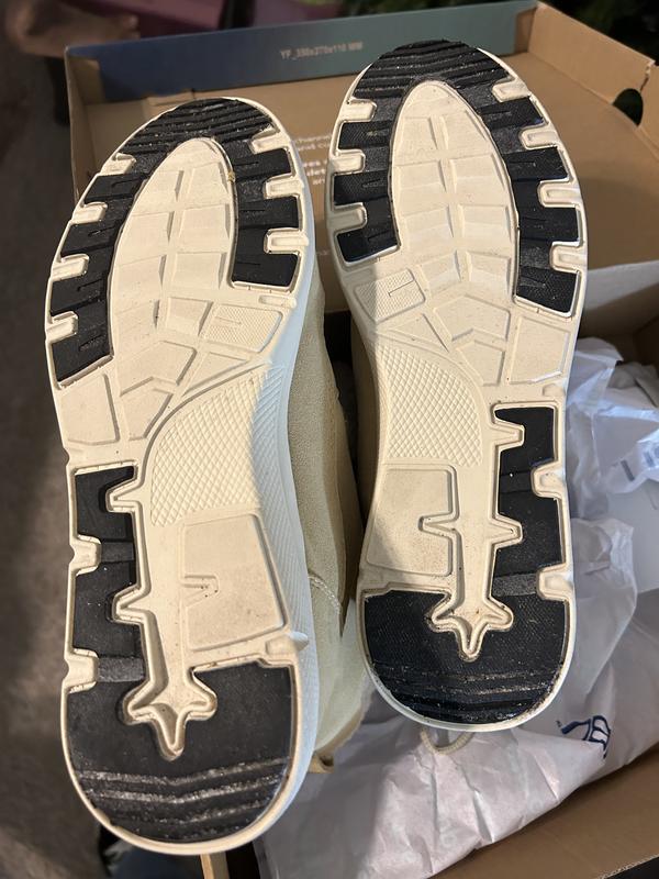 You can see the sand or dirt in the black parts of the boot.