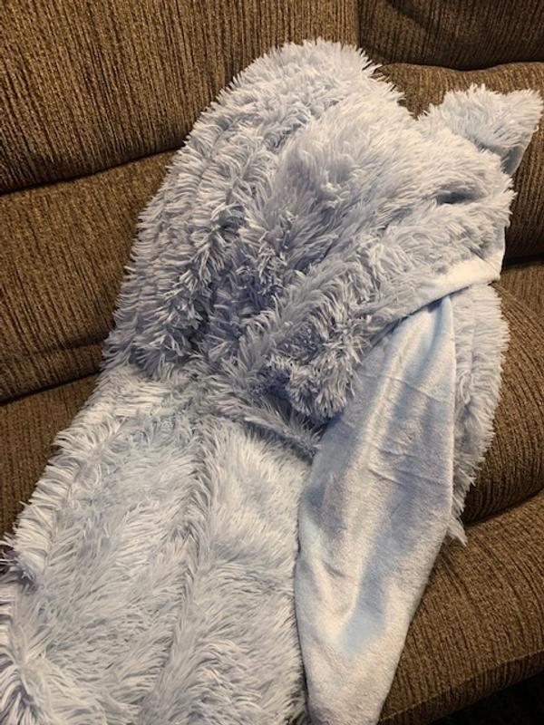 Draped on couch