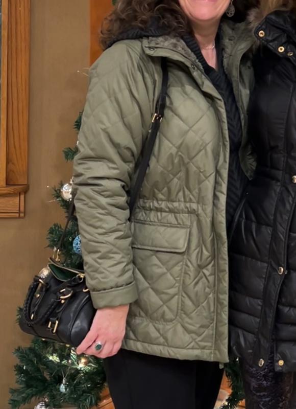 XL. The coat is true to size in my opinion.