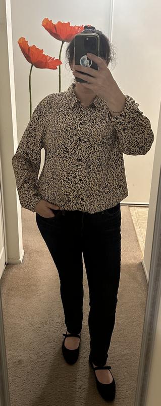 Shirt worn with black trousers.