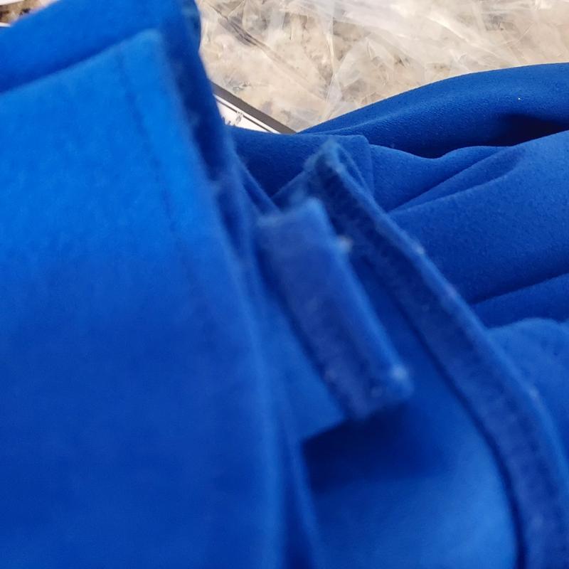 Fabric pills on hemline