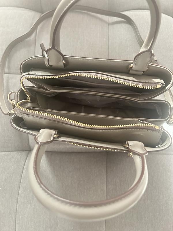 The color doesn’t look like Paige it looks more grey like the sofa.