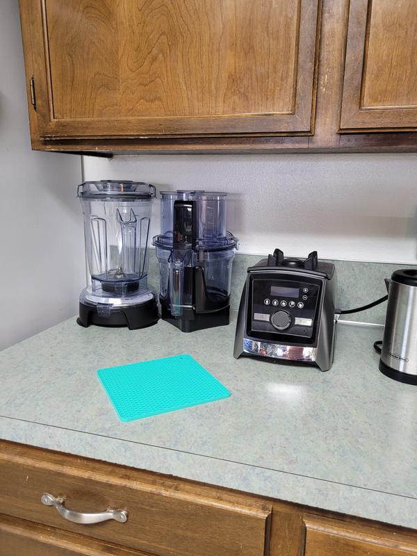 Space saver on counter over old processor and looks nice.