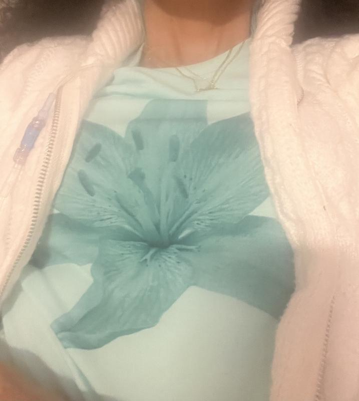 My incorrect color shirt. Should be green with in pink habiscus flower.