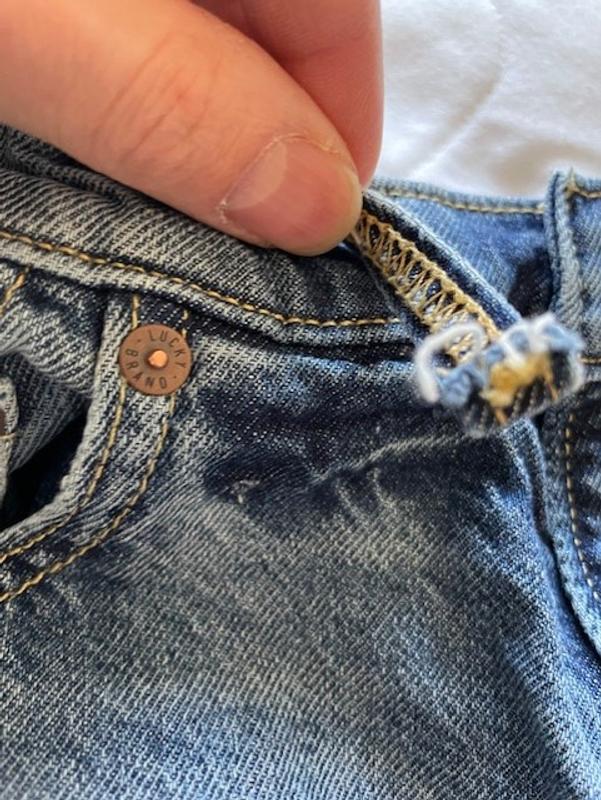 torn belt loop after first wash