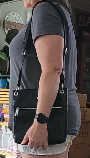 Nice size for shoulder bag or could be worn as crossbody too.