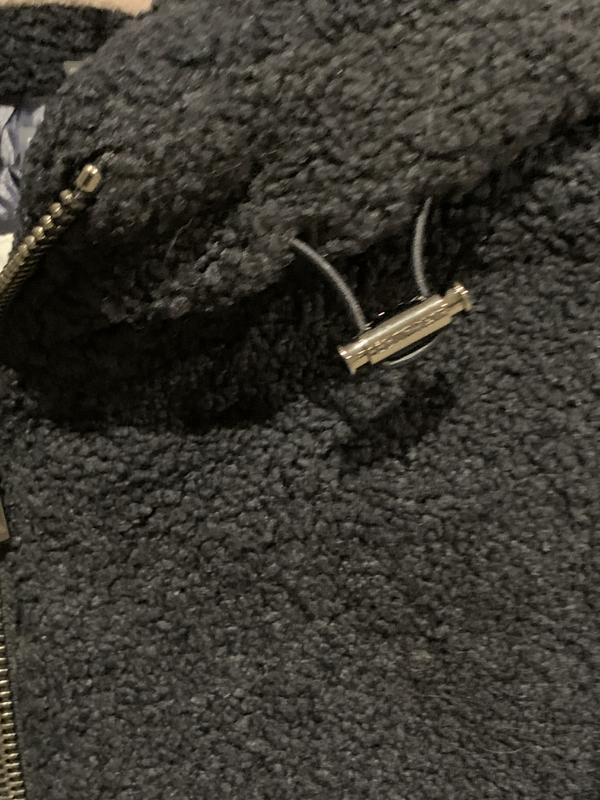 Adjustable toggles at hood