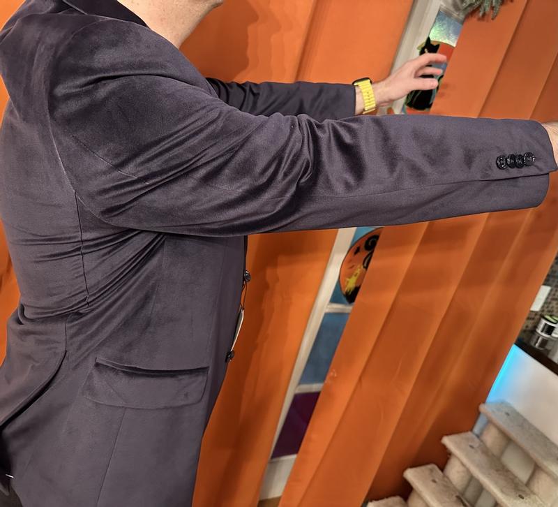 Arms out and up in this coat is rather restrictive in the shoulder area.