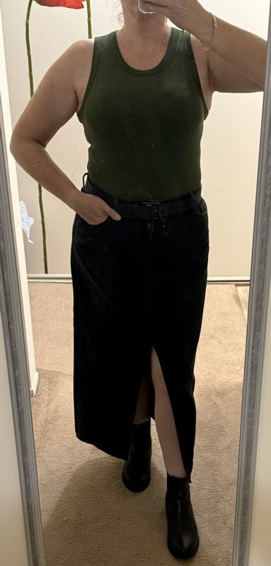 Bodysuit with denim maxi skirt.