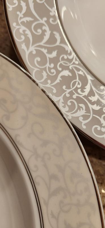New and existing versions of parchment with rubbed off trim