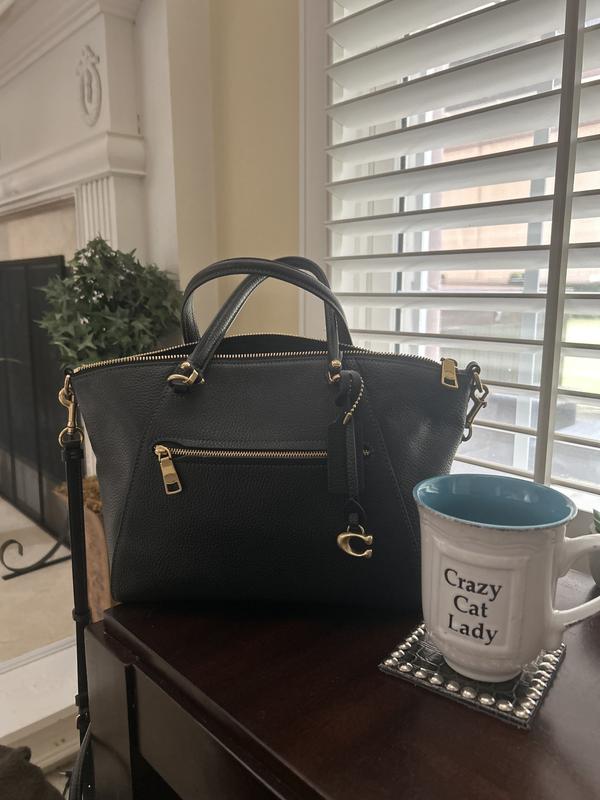 Bag with everything in it except the 1 phone.