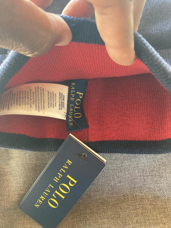 Inside of beanie showing reversible red color