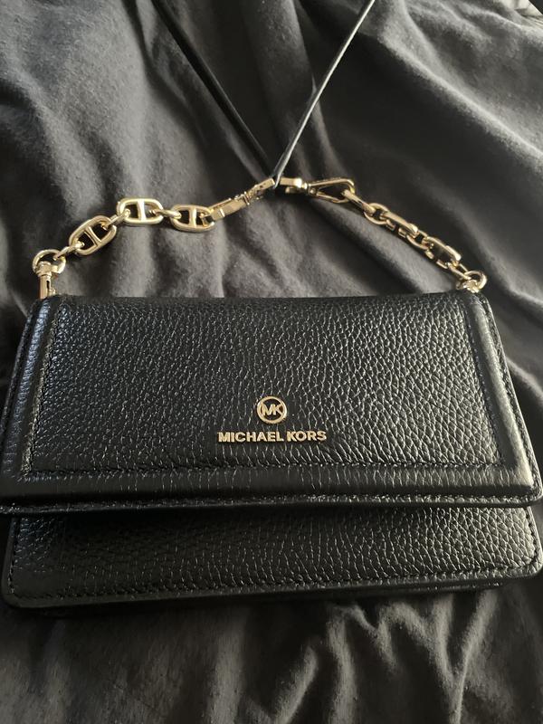 I purchased extenders to give a little more length.  It’s a great bag; good quality and stylish