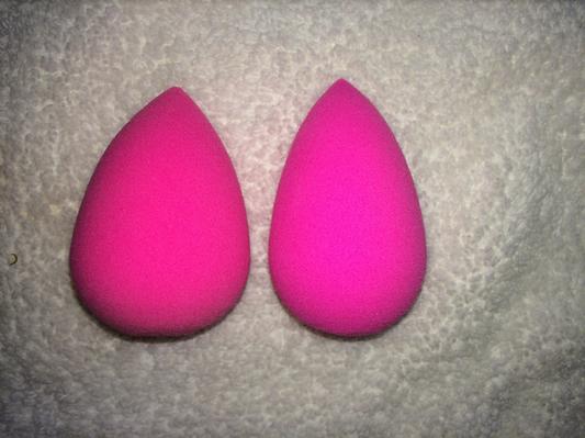 Both sponges are wet/damp. RIGHT: My new sponge is (more narrow than my old one) LEFT: Old sponge is a lot more rounded/wide.