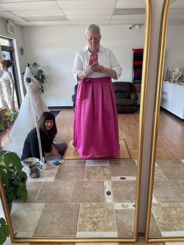 Being hemmed.