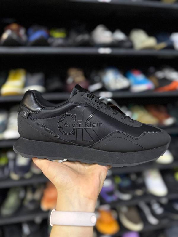 Wear sneakers with casual outfit while walking through city streets, showing comfort and style in natural daylight.