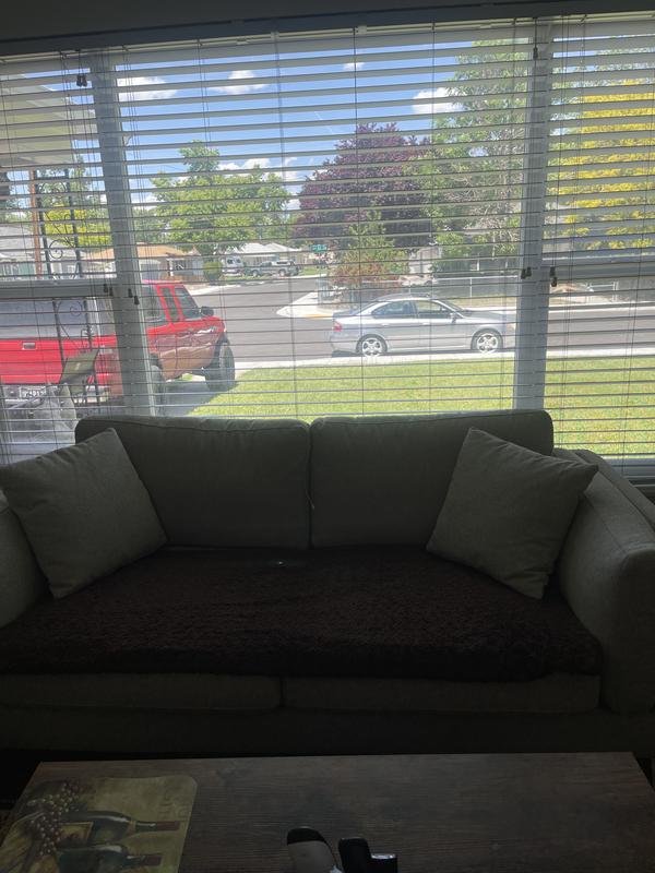 I put a soft brown cover on so, when the men come in from work it keeps it safe from their work jeans