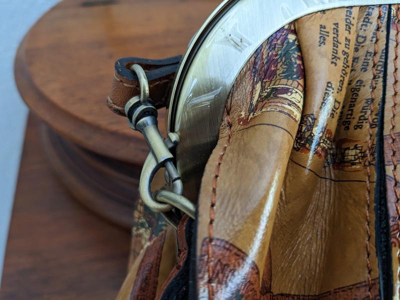 Lever of hook catches in closure unless hooked away from it.