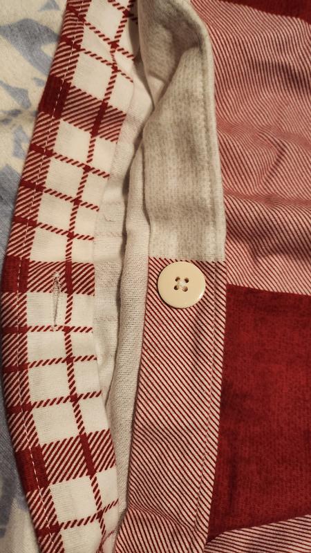 Buttons to allow another blanket to slip in