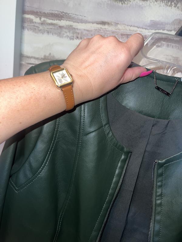 Styled with dark green