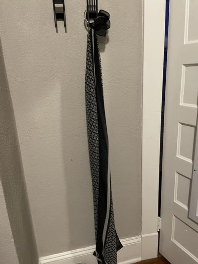 Scarf using provided hook (bonus) to show how long it is.