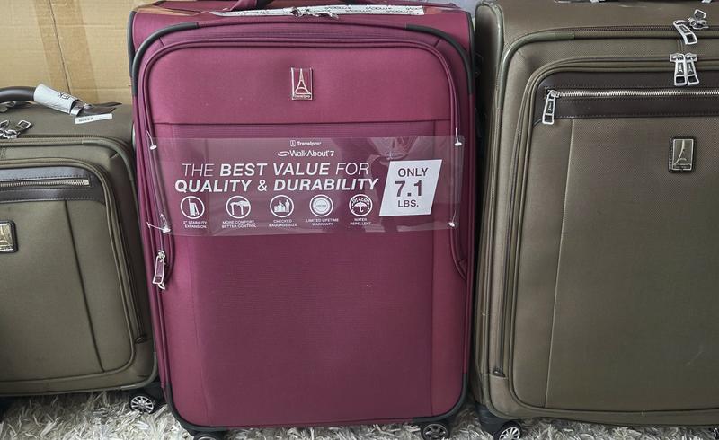 New bag next to my old Travelpro elite bag, same size and overall but trimmed down version.