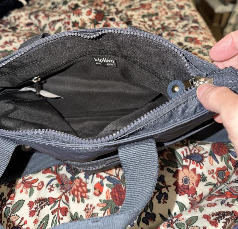 Long strap handle for over the shoulder and 2 handle for hand  carry