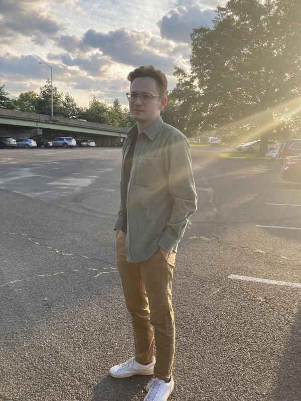 Shirt paired with khakis and white sneakers