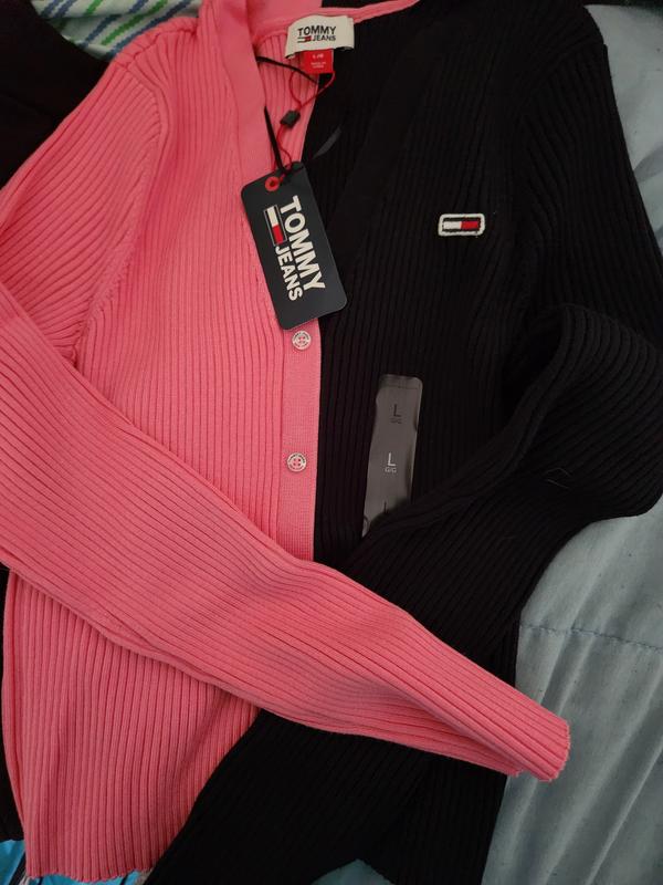 The picture is deceiving, because when I hold it up to my body, it falls just below the bust line.