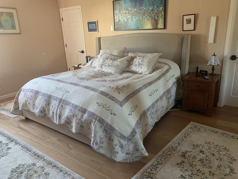 The painting above bed will be replaced. But we love our new bed makeover. Got new rugs too.