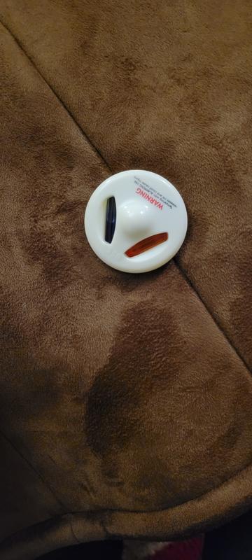 Security tab left on coat.