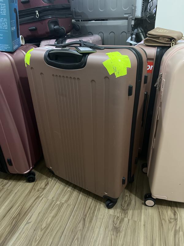 Neon tape on corners to identify luggage and also protect